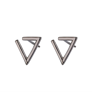 Macro detail of geometric hollow triangle stud earrings in dark gunmetal finish