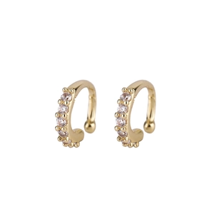 Gold plated ear cuffs with cubic zirconia inlay for non-pierced ears on white background
