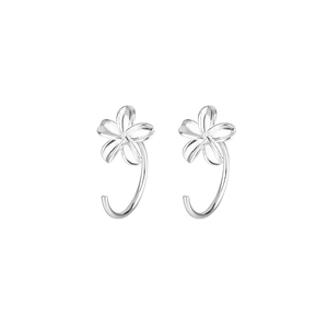 Macro detail of minimalist S925 silver plumeria flower earrings with hook design