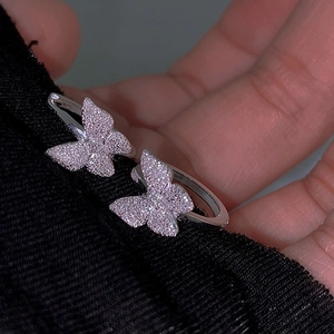 Silver double butterfly hoop earrings with sparkling white crystals for women