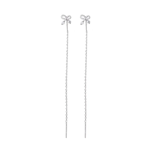 Silver bow tassel long earrings with cubic zirconia stones in elegant minimalist style