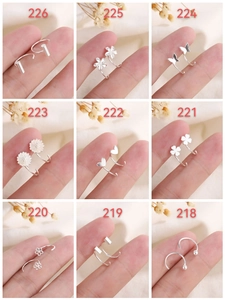 Detailed set of S925 silver stud earrings and ear cuffs featuring butterfly and heart shapes