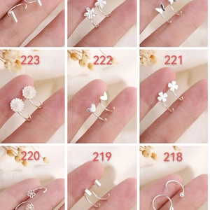 Nine-piece 925 silver plated earring set with flower, butterfly, and heart designs