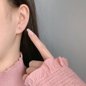 Minimalist S925 sterling silver asymmetric circle stud earrings with zircon stones on ear