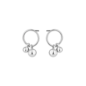 Detail of silver S925 sterling silver hoop earrings with dual hanging geometric beads