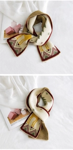 Detail of Nordic knit scarf with reindeer patterns and vintage color-block weaving