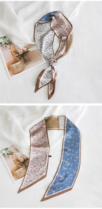 Détails du foulard twilly en soie à fleurs et pois utilisé comme bandeau ou petit foulard