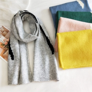 Thick striped knit winter scarf for women in light grey with diverse color variations