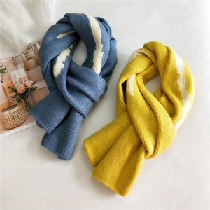 Thick striped knit winter scarf for women in bright yellow and blue colors