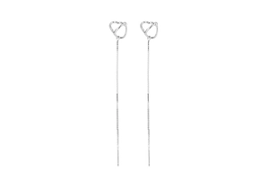 Detailed view of silver long tassel earrings with minimalist heart-shaped hollow studs