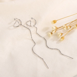 Silver hollow heart long tassel earrings with sleek box chains in a minimalist style