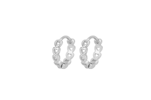 Detailed view of S925 sterling silver hoop earrings with hollow heart pattern