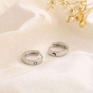 Minimalist S925 sterling silver huggie earrings with sun and moon engraved charms