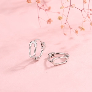 Polished S925 sterling silver safety pin earrings with a minimalist oval buckle design