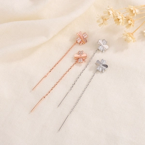 Elegant four-leaf clover threader earrings with cubic zirconia in rose gold and silver