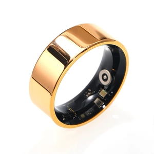 Gepolijste gouden smart ring met sensoren voor hartslag en slaapmonitoring