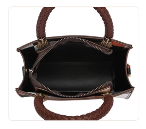 Internal view of plaid tote bag featuring a zip compartment and woven handles