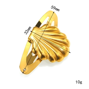 Detail view of 18K gold shell hair clip with precise 59mm length measurements