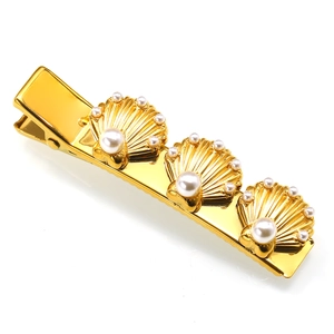 Golden starfish shell hair clip with pearls for beach style and elegant hair decoration