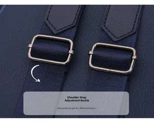 Detail of adjustable nylon shoulder strap with gunmetal buckle on navy leather backpack