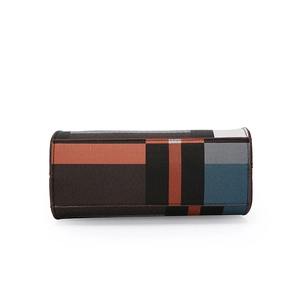Minimalist urban shoulder bag with geometric color block patchwork and brown leather trim