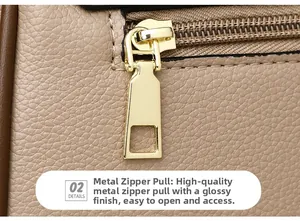 Makro-Detail des goldenen Reißverschlusses an beiger Schultertasche aus Leder mit Lychee-Muster