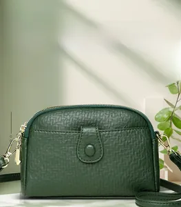 Elegant dark green lychee pattern leather square bag with gold metal buckles and strap