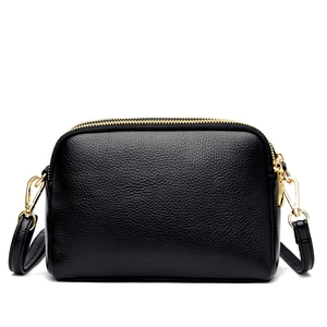 Elegant black lychee leather square shoulder bag with gold double zippers and strap