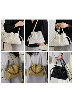 Detailed views of ruched cloud bags in white, olive, and black with pearl chain decor