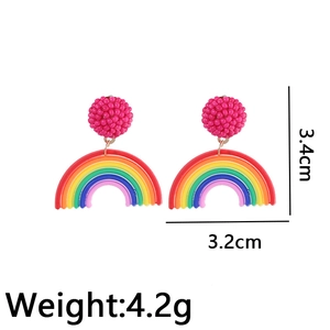 Rainbow seed bead earrings featuring a magenta top and multi-color arch design