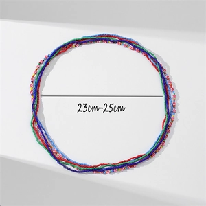 Detail of colorful African waist beads with daisy flowers showing 23-25cm sizing