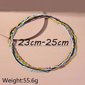 Close-up of layered colorful glass bead waist chains with weight and length specification