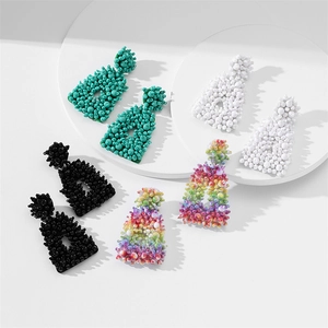 Handmade beaded trapezoid drop earrings set in green white black and rainbow colors