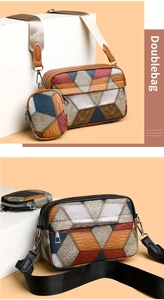 Detail of geometric patchwork crossbody bag with textured leather and wide canvas strap