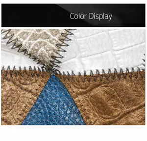 Detail of color-block crocodile texture faux leather with zig-zag stitching on small bag