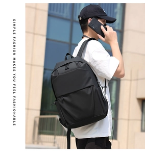 Side view of black urban backpack with adjustable buckle on high-density fabric