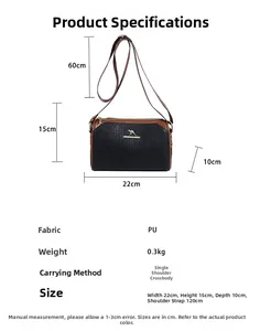 Detailed dimensions of black pebble leather camera bag showing 22cm width and 15cm height