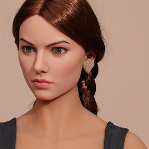 Close-up of heart-shaped flocked earrings in khaki worn on ear for style display