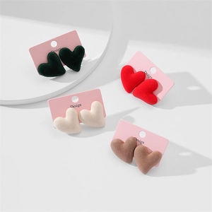 Velvet heart stud earrings set in dark green, red, cream, and brown colors