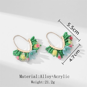 Détail de boucles d'oreilles de Noël avec fleurs en acrylique et dimensions