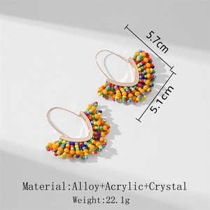 Boucles d'oreilles de Noël faites main avec perles et franges bohèmes en forme de V