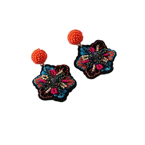 Handmade bohemian beaded earrings with floral embroidery and colorful beadwork design