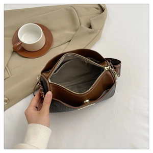 Detailed top view of the spacious interior compartments and multi-layer lining of the bag