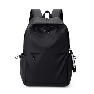 Minimalist black water-resistant business backpack with decorative fashion strap and pockets