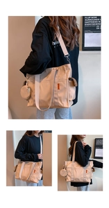 Detail view of khaki large tote bag with adjustable strap and small round coin purse