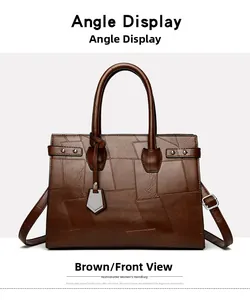 Detail of brown patchwork tote bag with silver metal shield pendant and leather texture