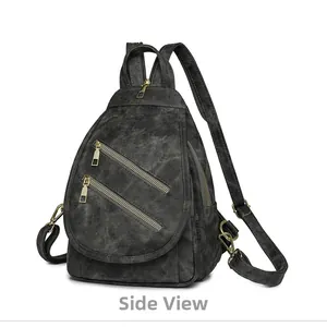 Vista lateral de bolso bandolera vintage gris oscuro con cremalleras doradas