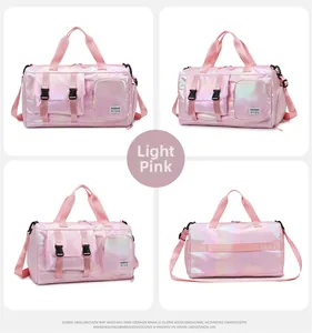 Detail view of pink iridescent fitness bag with multi-functional compartments and adjustable strap