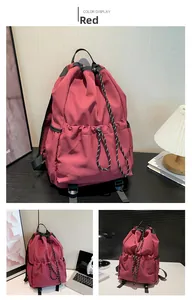 Three-way view of a red waterproof nylon drawstring backpack in a campus study setting