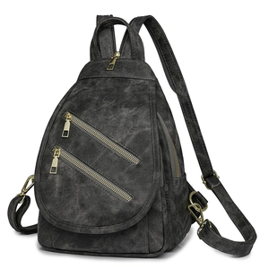 Bolso de pecho retro en lona gris con múltiples bolsillos y cierres dorados